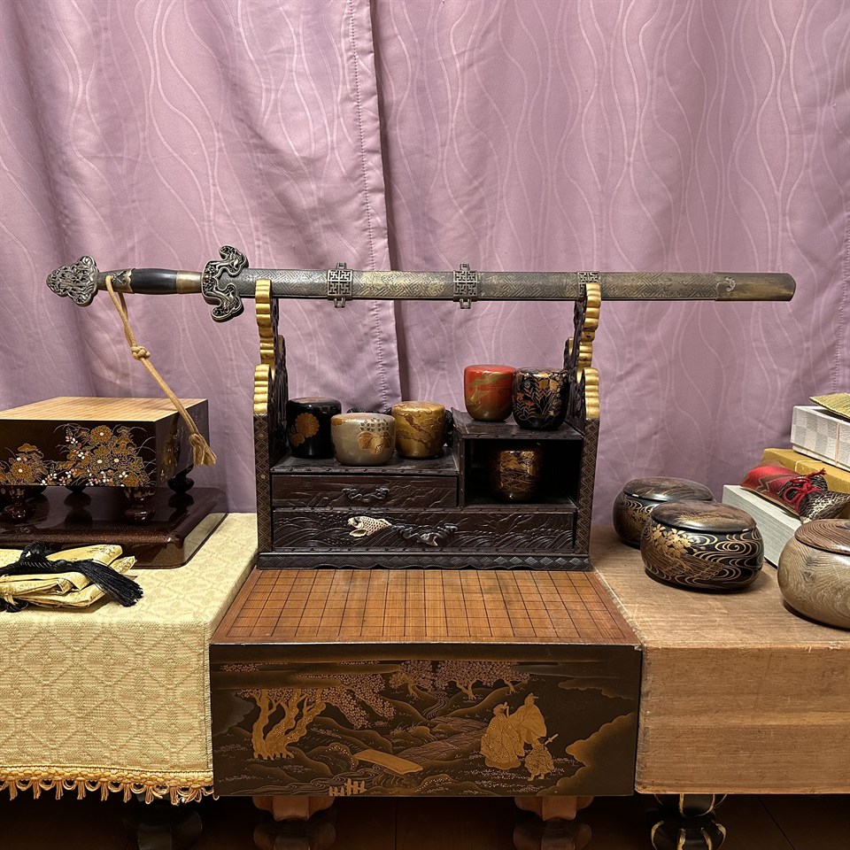 A jian on a wooden stand
